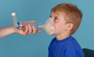 Child with mask over mouth and nose